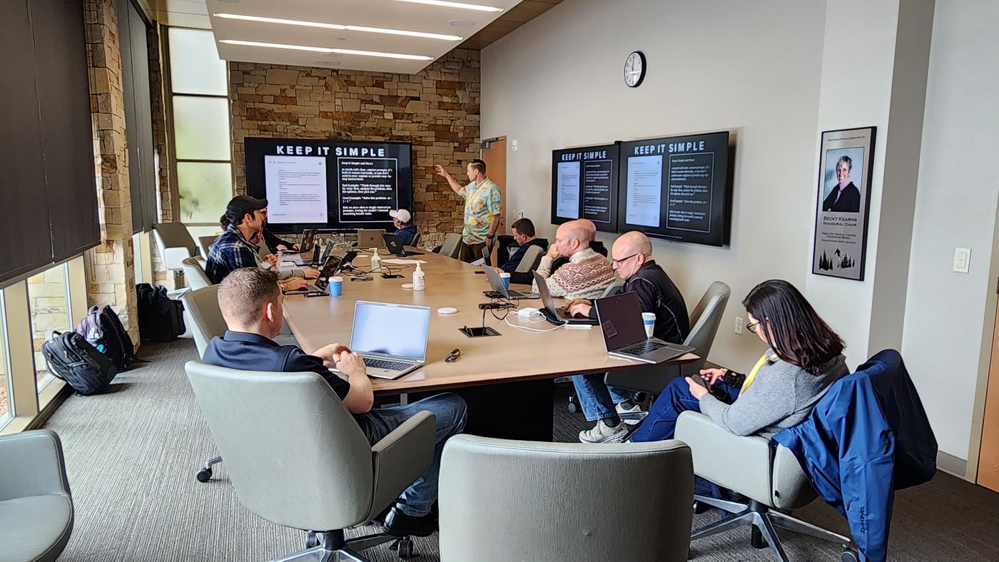A roundtable discussion around a conference table