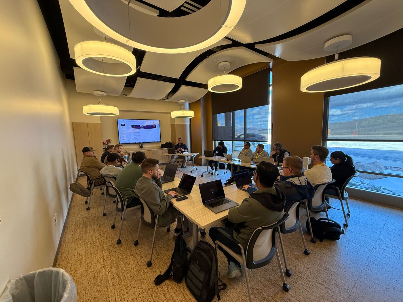 A training room with mountain views through the windows